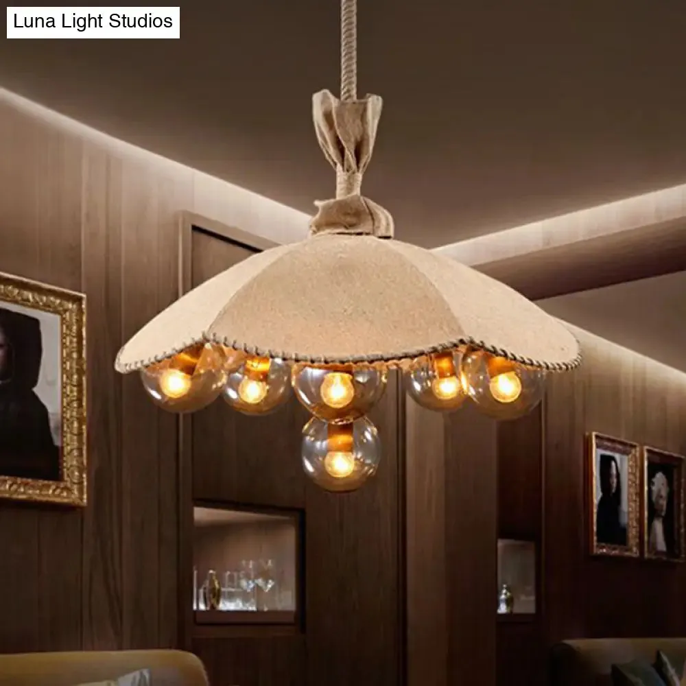 Beige Scalloped Pendant Light: Lodge Chandelier with 6 Fabric Heads & Glass Ball Shade