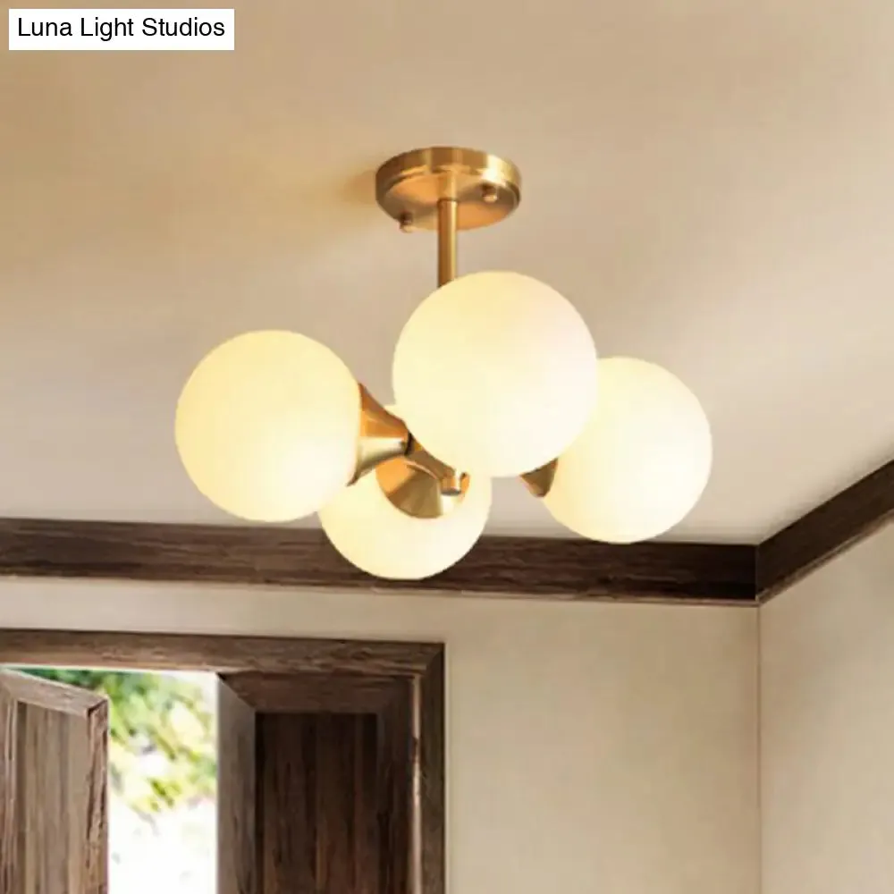 Brass Globe Semi Flush Mount Light with Opal Glass - Postmodern Design for Bedroom